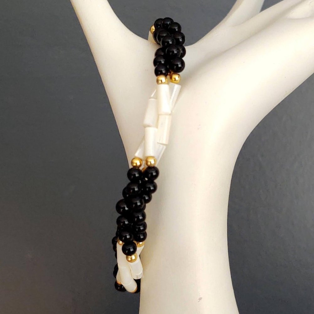MOP and black beaded bracelet with gold accents